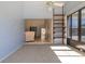 Bright sun room with tile floor and views to the living room at 120 Black Duck Cir, Daytona Beach, FL 32119