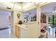 Bright kitchen with an open layout leading to the living room at 120 Hibiscus Woods Ct # 14D, Deltona, FL 32725