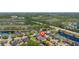 Residential aerial view of homes with tree-lined streets and waterways at 1205 Draycott St, Ormond Beach, FL 32174