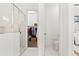 Bright bathroom with glass enclosed shower, walk-in closet and private toilet at 1205 Draycott St, Ormond Beach, FL 32174