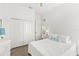 Calming bedroom with white walls, wood-look flooring, and a serene ambiance at 1205 Draycott St, Ormond Beach, FL 32174