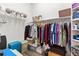 Walk in closet with hanging clothes, shelves, and storage at 1205 Draycott St, Ormond Beach, FL 32174