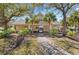 Charming community clubhouse surrounded by lush landscaping, offering a welcoming space for gatherings at 1205 Draycott St, Ormond Beach, FL 32174