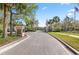 Elegant community entrance with mature trees and manicured lawns, creating a welcoming and picturesque first impression at 1205 Draycott St, Ormond Beach, FL 32174
