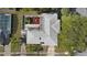 Aerial view of a home highlighting the pool and a unique patio perfect for entertaining at 1254 Mardrake Rd, Daytona Beach, FL 32114