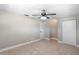 Bedroom with ceiling fan, tile floors, and closet at 1254 Mardrake Rd, Daytona Beach, FL 32114