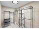 Walk-in closet provides metal shelving and clothing rods for organization at 1254 Mardrake Rd, Daytona Beach, FL 32114