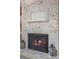 Elegant fireplace with stone surround, decorative ironwork, and classic design elements at 1254 Mardrake Rd, Daytona Beach, FL 32114