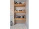 Close-up of a stone fireplace with decorative shelves and stylish accents at 1254 Mardrake Rd, Daytona Beach, FL 32114