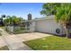 Charming single-story home featuring a white picket fence, manicured lawn, and a two-car garage at 1254 Mardrake Rd, Daytona Beach, FL 32114