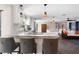 Spacious open kitchen with breakfast bar, granite countertops, and modern lighting at 1254 Mardrake Rd, Daytona Beach, FL 32114