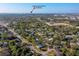 Beautiful aerial view of a residential neighborhood with Daytona International Speedway in the background at 1304 Genmar St, Daytona Beach, FL 32117