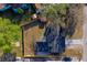 Aerial view of the house featuring a spacious backyard surrounded by a wooden fence at 1304 Genmar St, Daytona Beach, FL 32117