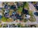 Overhead view of the home with a fenced yard and in-ground pool in the backyard at 1304 Genmar St, Daytona Beach, FL 32117