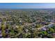 Picturesque aerial view of a neighborhood featuring residential homes surrounded by lush greenery at 1304 Genmar St, Daytona Beach, FL 32117