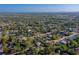 Expansive aerial view of the neighborhood showcasing the lush green trees and residential homes at 1304 Genmar St, Daytona Beach, FL 32117