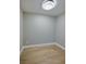 Neutral room with new wood-look flooring and a modern ceiling light at 1304 Genmar St, Daytona Beach, FL 32117