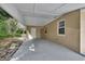 View of the carport, showcasing ample space and access to the home at 1434 Deltona Blvd, Deltona, FL 32725
