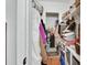 Walk-in closet with multiple shelves and hanging storage at 1434 Deltona Blvd, Deltona, FL 32725