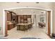 Gourmet kitchen with a large island, custom cabinetry, and high-end stainless steel appliances at 1450 Shady Meadow Ln, Deland, FL 32724