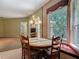 An eat-in kitchen area featuring a dining table with chairs at 1490 Kettledrum Trl, Enterprise, FL 32725