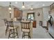 Eat-in kitchen with an island that offers seating for three and lots of counter space at 1512 Lancashire Way, Deland, FL 32720