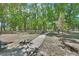 Beautiful park featuring green grass, mature trees, and a cement walking path at 1512 Lancashire Way, Deland, FL 32720
