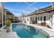 Inviting screened-in pool and patio area provides a private outdoor oasis at 1540 Park Forest Blvd, Mount Dora, FL 32757