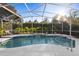 Spacious pool area with tropical foliage, ideal for entertaining and relaxation at 1540 Park Forest Blvd, Mount Dora, FL 32757