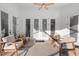 Cozy sunroom with comfortable seating, ideal for relaxation and enjoying the outdoors at 1540 Park Forest Blvd, Mount Dora, FL 32757