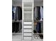 Custom walk-in closet featuring hanging racks, drawers, and shelving for optimal storage at 1540 Park Forest Blvd, Mount Dora, FL 32757