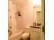 Cozy bathroom featuring shower-tub combo, granite countertop on vanity and decorative shower curtain at 1602 15Th St, Orange City, FL 32763