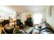 Spacious living room with hardwood floors, modern decor and comfortable seating arrangements at 1602 15Th St, Orange City, FL 32763