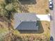 Aerial shot of a modern home with a well manicured yard at 1820 18Th St, Orange City, FL 32763