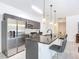 Bright kitchen featuring stainless steel appliances, a center island, and stylish pendant lighting at 1820 18Th St, Orange City, FL 32763