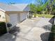 Spacious three car garage with a large driveway and immaculate lawn at 19 Twin River Dr, Ormond Beach, FL 32174