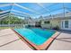 Enjoy this screened-in pool area, perfect for entertaining and relaxation in the Florida sun at 19 Twin River Dr, Ormond Beach, FL 32174