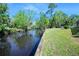 Enjoy serene water views from this waterfront property, perfect for nature lovers at 19 Twin River Dr, Ormond Beach, FL 32174