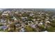 Picturesque neighborhood with tree-lined streets and diverse architectural styles, providing a charming residential setting at 205 Mary Ave, New Smyrna Beach, FL 32168