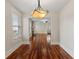 Elegant dining room featuring hardwood floors and natural light at 205 Mary Ave, New Smyrna Beach, FL 32168