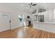 Bright open kitchen with modern appliances, white cabinets, and natural light at 205 Mary Ave, New Smyrna Beach, FL 32168