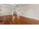 Bright living room featuring hardwood floors and white walls at 205 Mary Ave, New Smyrna Beach, FL 32168