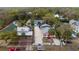 Charming homes line a street with mature trees and well-maintained yards, creating a welcoming neighborhood atmosphere at 205 Mary Ave, New Smyrna Beach, FL 32168