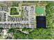 Bird's eye view of a community featuring manicured lawns, ponds, walking paths, and residential houses at 2090 Prairie Sage Ln, Longwood, FL 32750