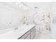 Modern bathroom featuring double sinks and a marble-themed shower curtain, offering style and functionality at 2090 Prairie Sage Ln, Longwood, FL 32750