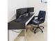 Functional office space with sleek desk setup, providing a dedicated area for work or study at 2090 Prairie Sage Ln, Longwood, FL 32750