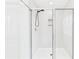 Contemporary shower featuring glass doors, modern fixtures, and niche for storage at 2090 Prairie Sage Ln, Longwood, FL 32750
