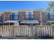 Charming brick townhouse featuring private balconies, awnings and secure fenced entry at 2200 S Palmetto Ave # C040, Daytona Beach, FL 32119
