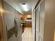Galley kitchen with stainless steel appliances, granite countertops, and ample cabinet storage at 2200 S Palmetto Ave # C040, Daytona Beach, FL 32119