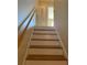 View of staircase with handrail leading to the next level of the home at 2200 S Palmetto Ave # C040, Daytona Beach, FL 32119